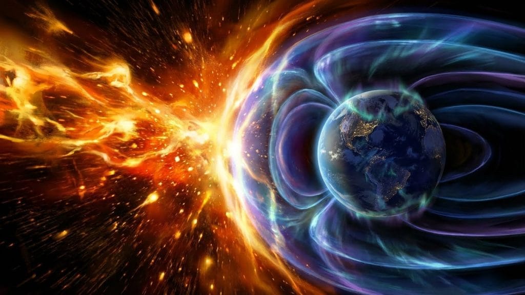 Salı günü Dünya'ya ulaşması beklenen G3/G4 seviyesindeki güçlü manyetik fırtınanın, gezegenimizin manyetik kalkanıyla etkileşime girdiği anı gösteren illüstrasyon.
